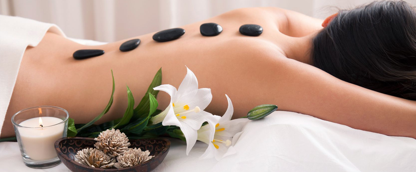 Massage Image with rocks on back at The Spa at Lakeside at Lakeside Event Center